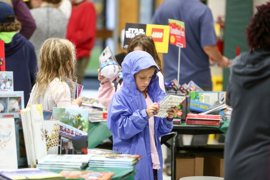 Little Girl Reading a Book