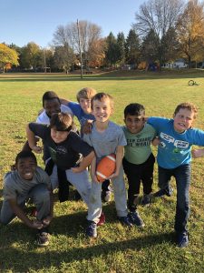 Students Playing Football