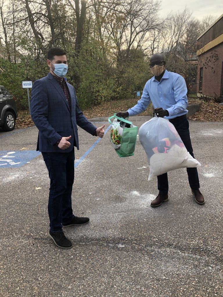 Parent University staff collect items for clothing drive