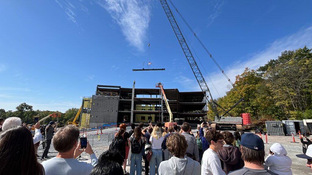 the final beam being raised into place