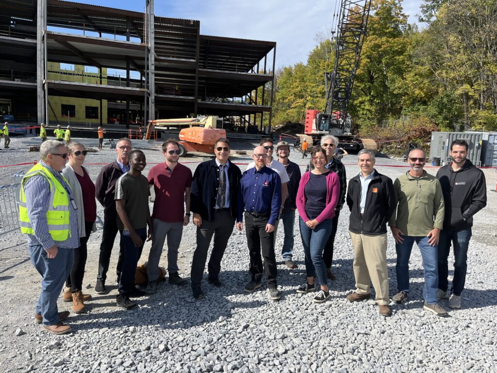 The design team poses for a photo