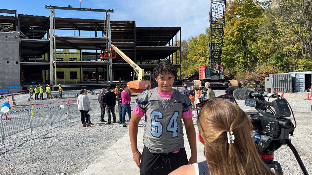student gives a tv interview