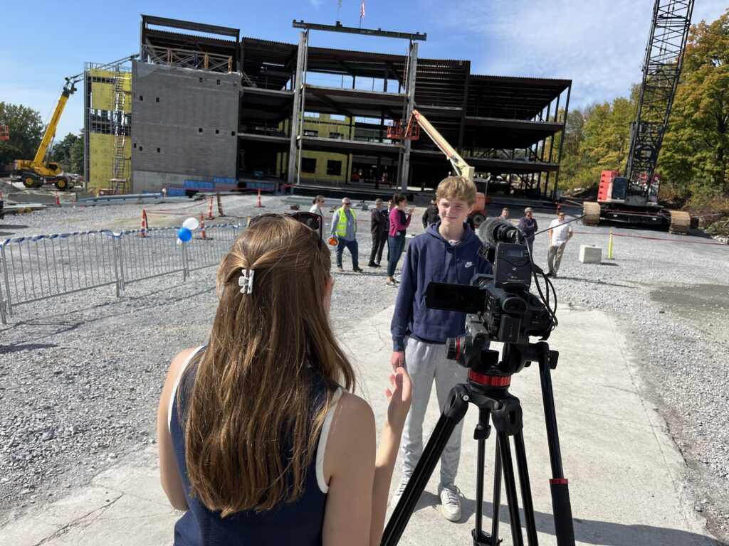 a student gives a tv interview