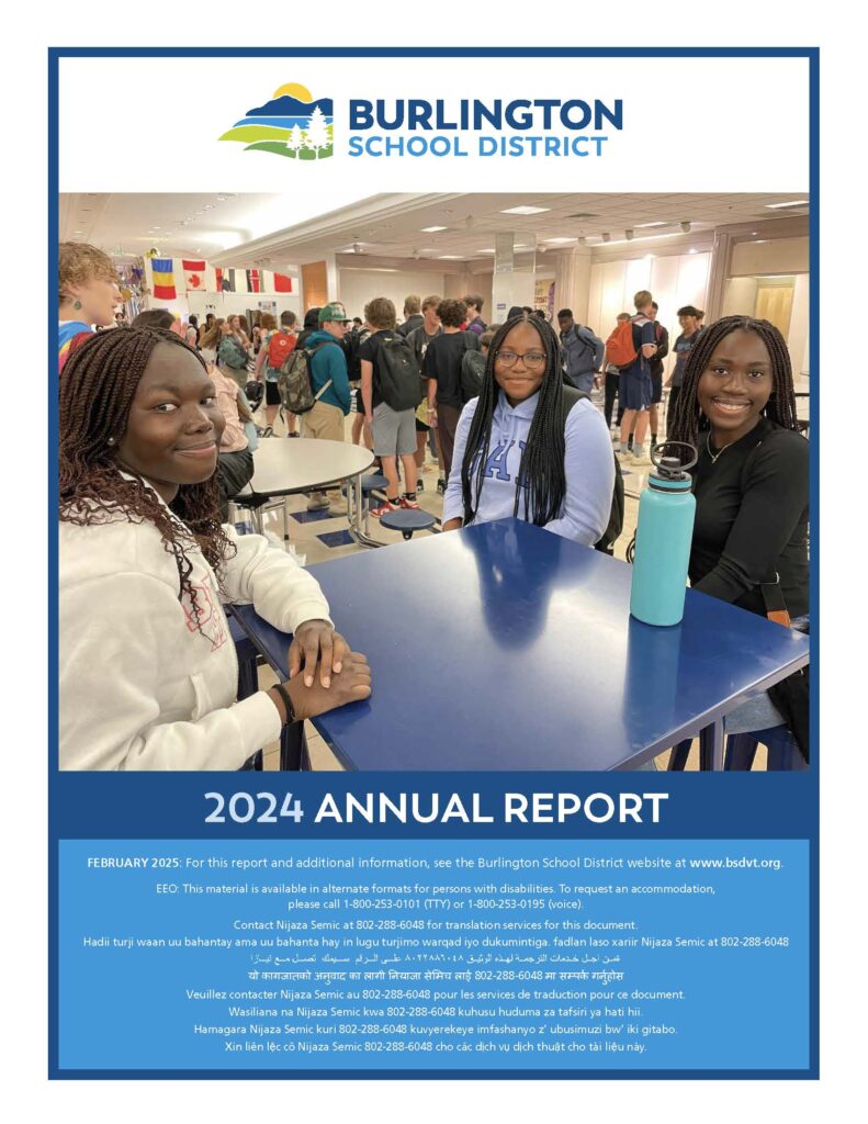 Cover page of annual report showing three high school girls smiling