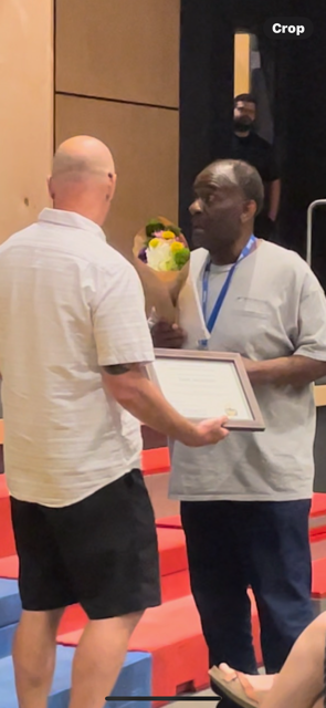 Sam Jackson receiving his award