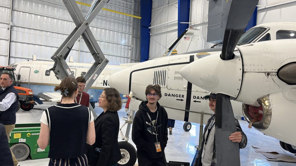 students showing airplanes