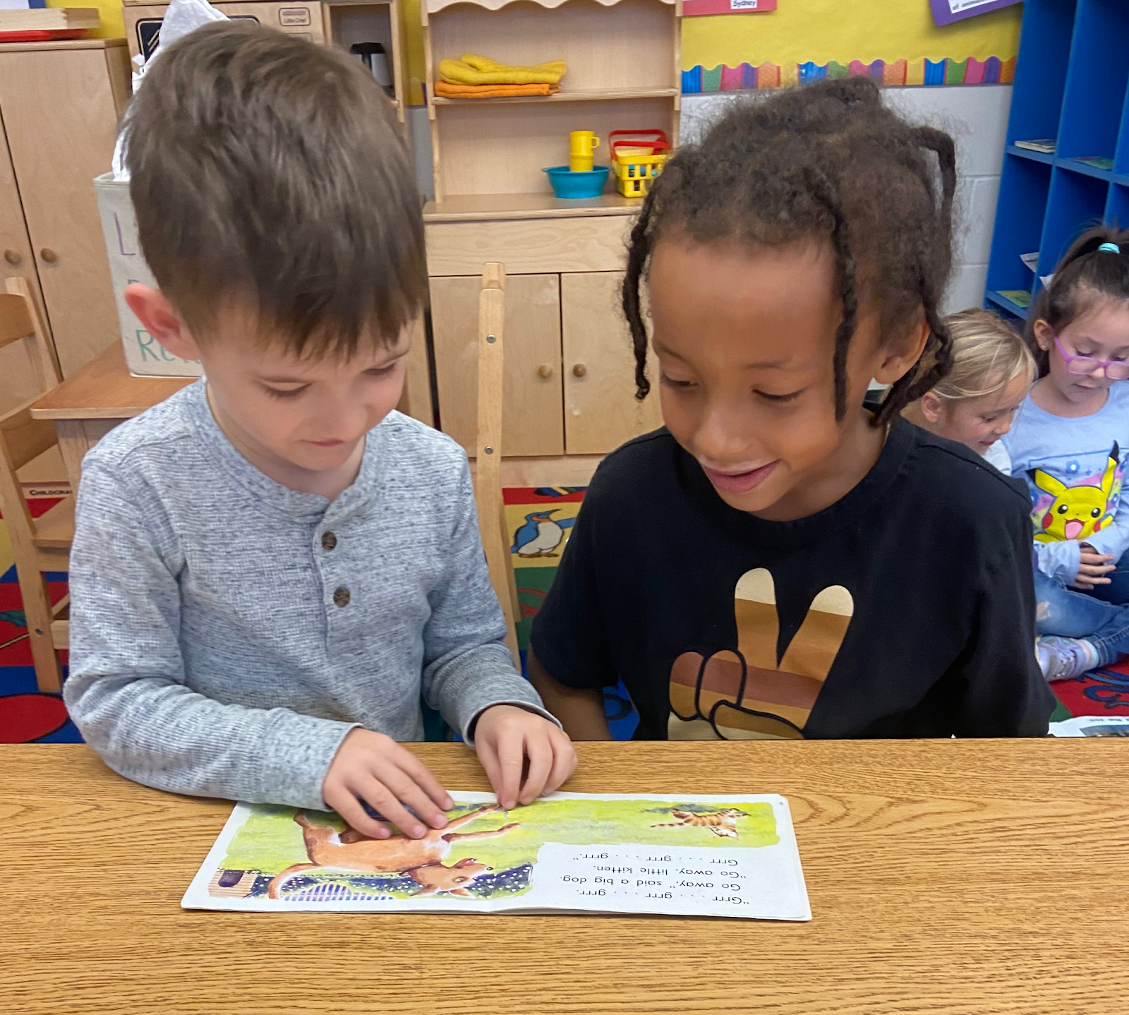 Kindergarteners Reading a book!
