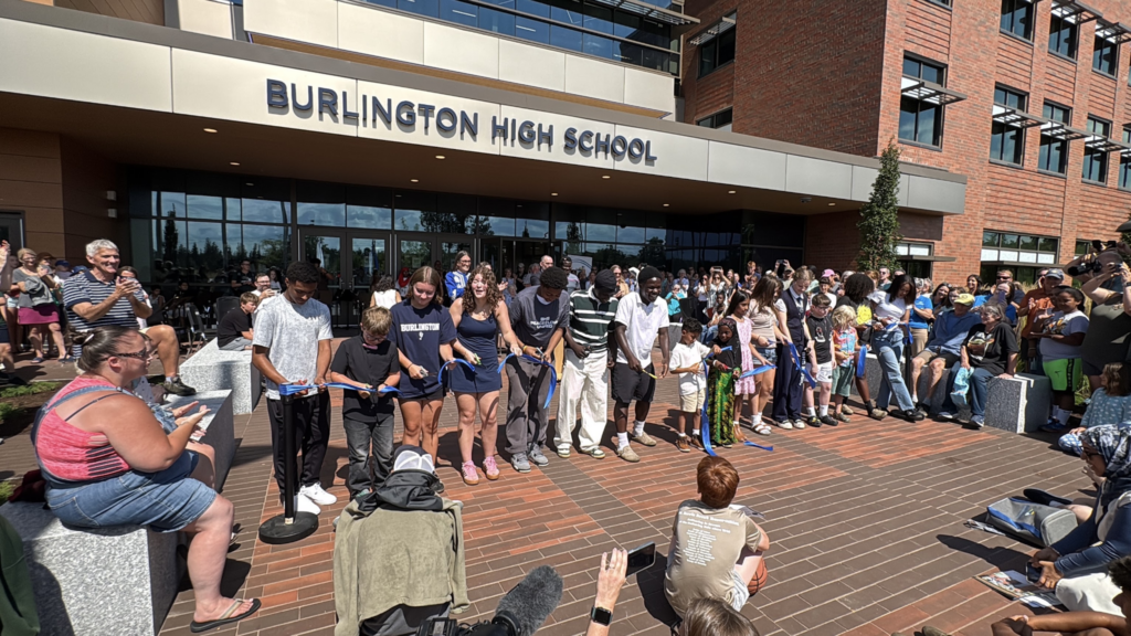 Various students cut the ribbon for the new school!