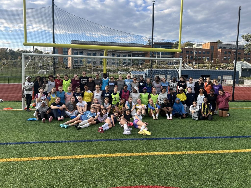BHS and EMS soccer teams posing together