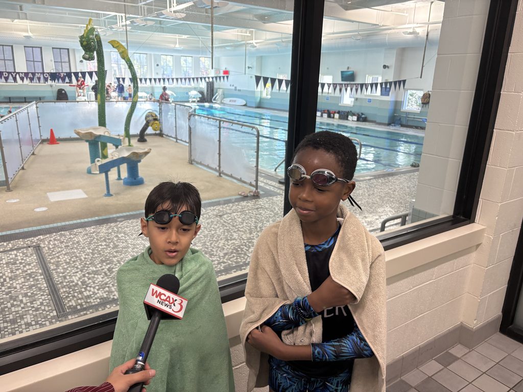 two students interviewing about the impact of the safety around water program